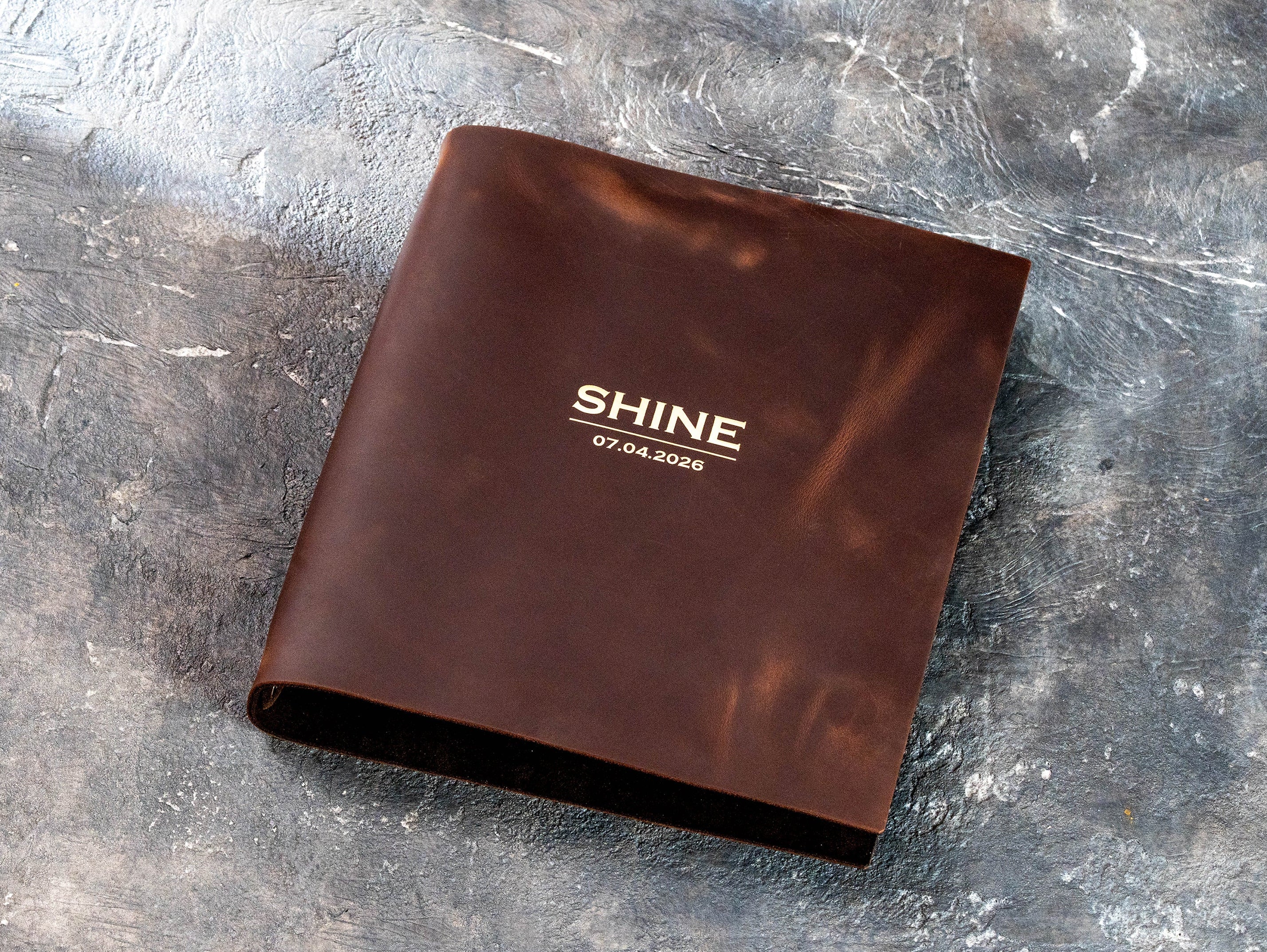 Personalized soft brown leather wedding binder with SHINE title and 07.04.2026 date
