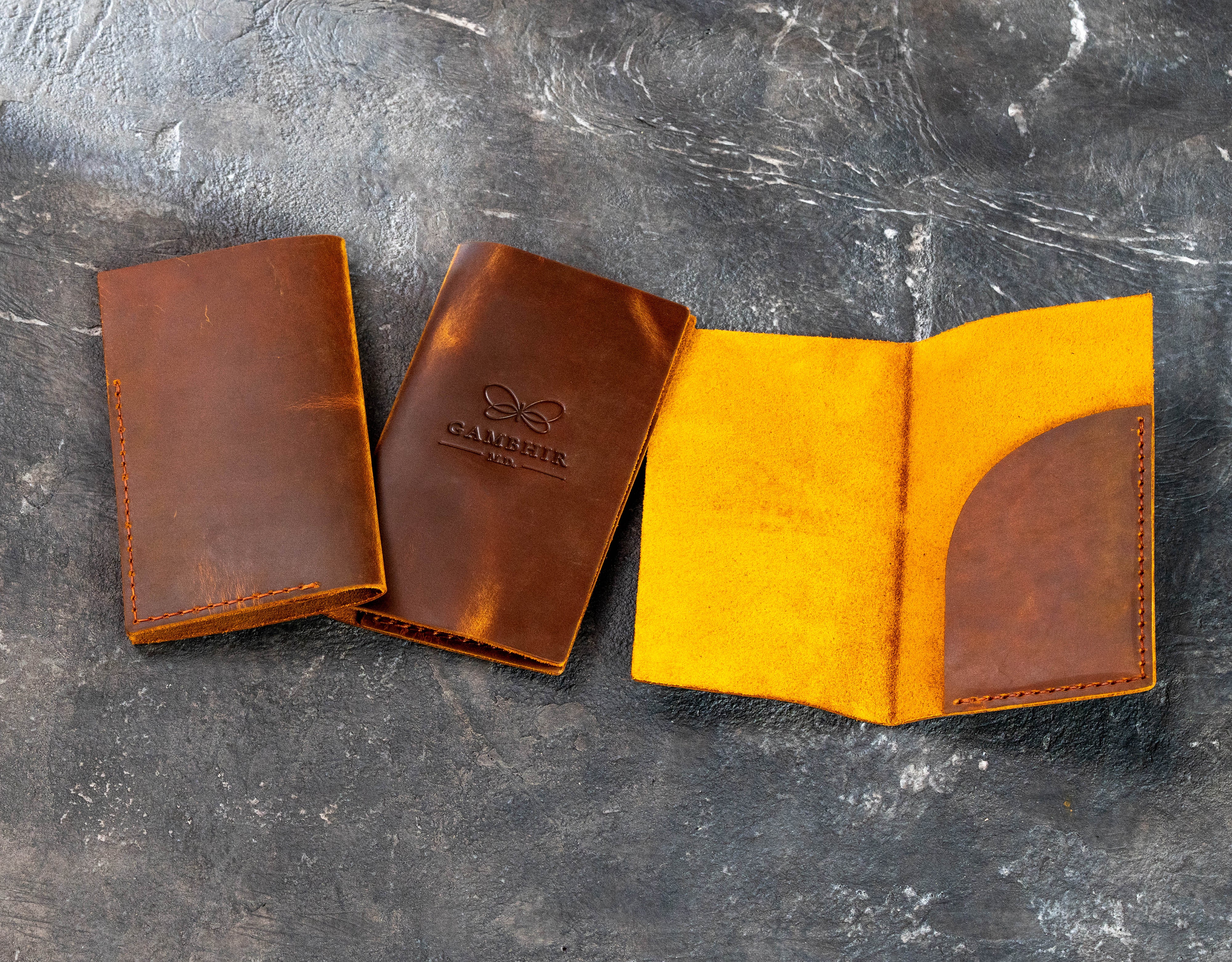 Chestnut Crazy Horse leather check presenters for Gambhir M.D. with stitched bill pocket and vintage finish