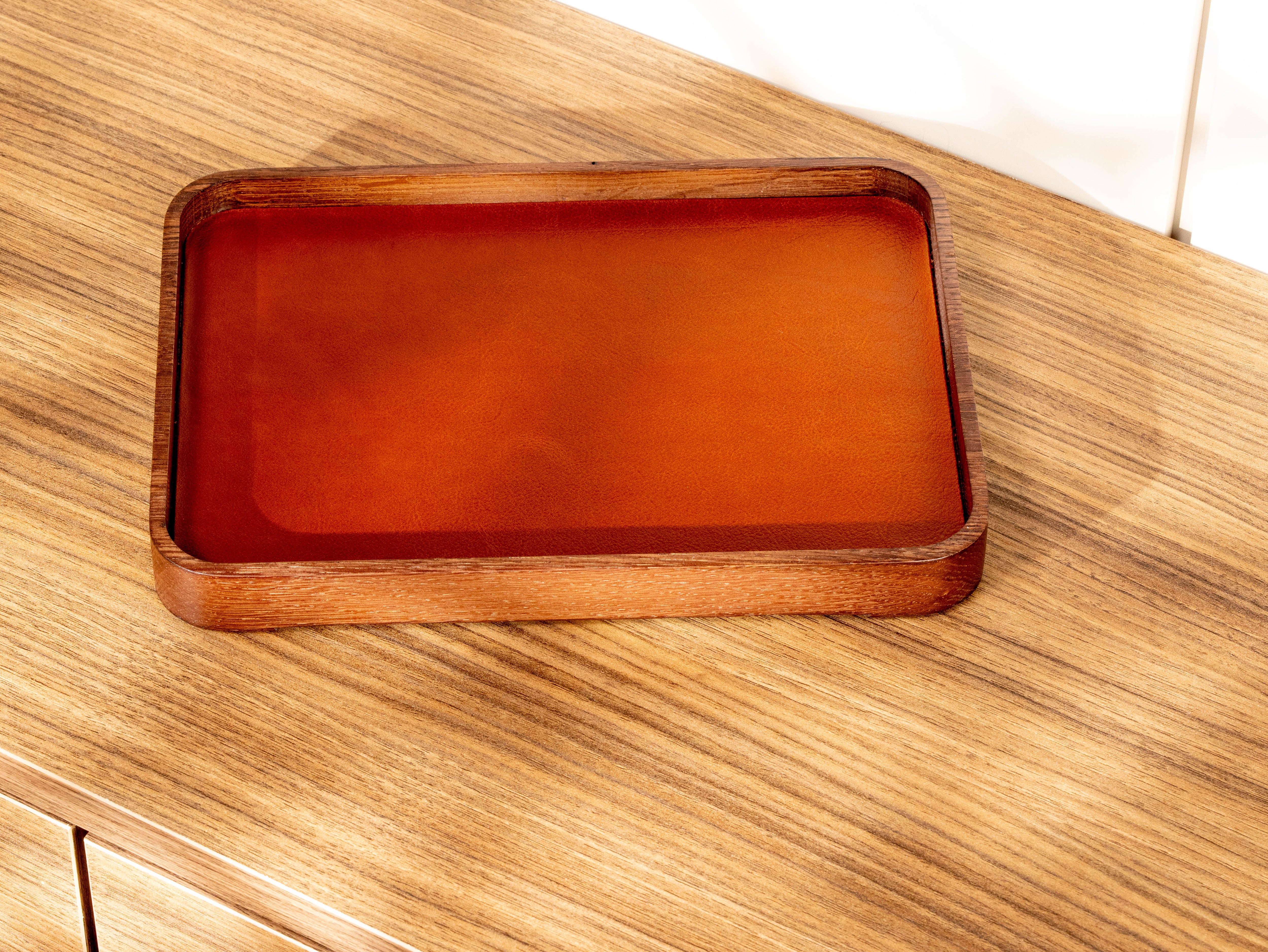 Empty personalized oak valet tray with smooth Camel top-grain leather insert and raised wooden sides.