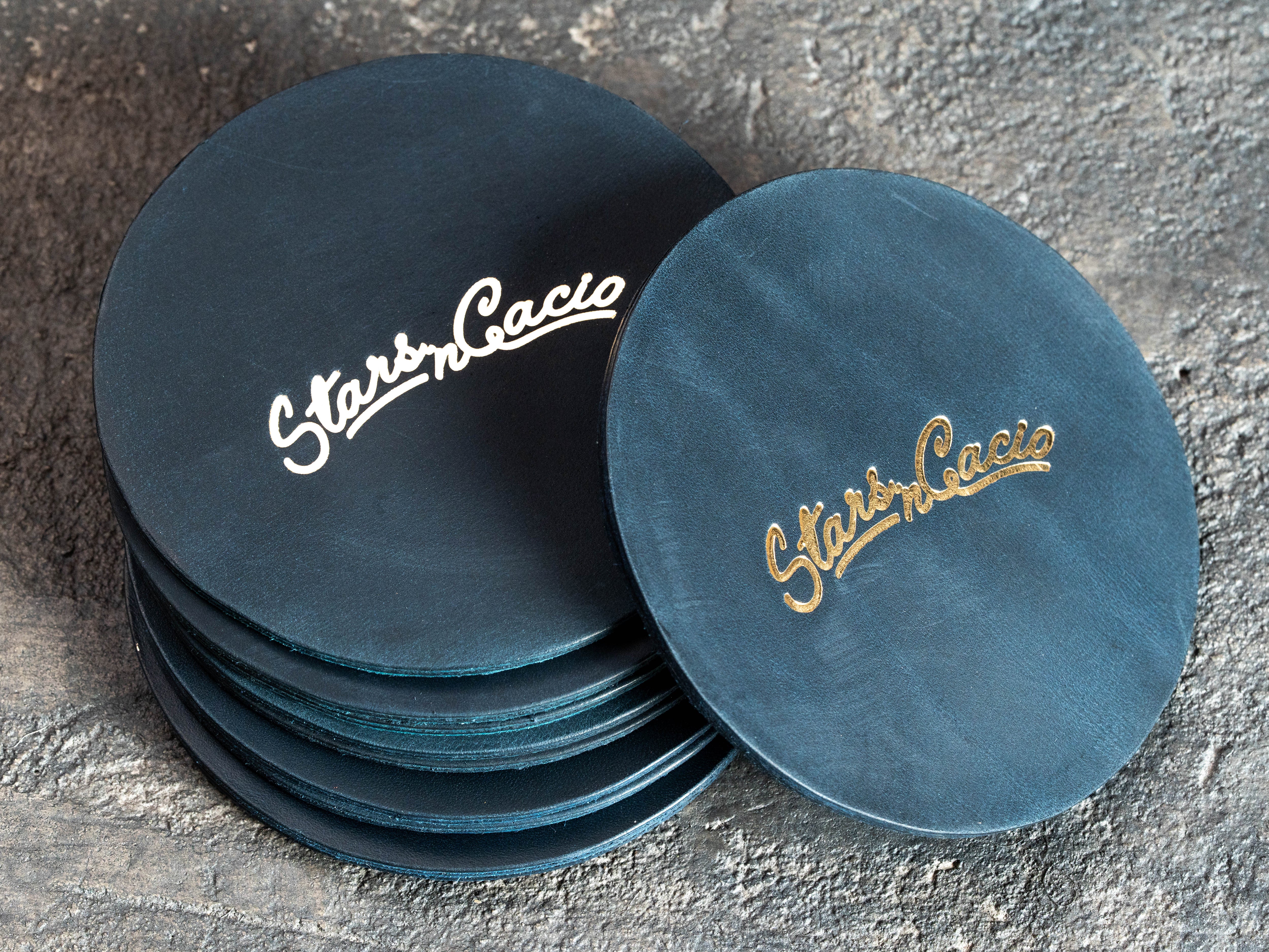 Custom blue Crazy Horse leather coasters with gold foil Star in Cacio logo