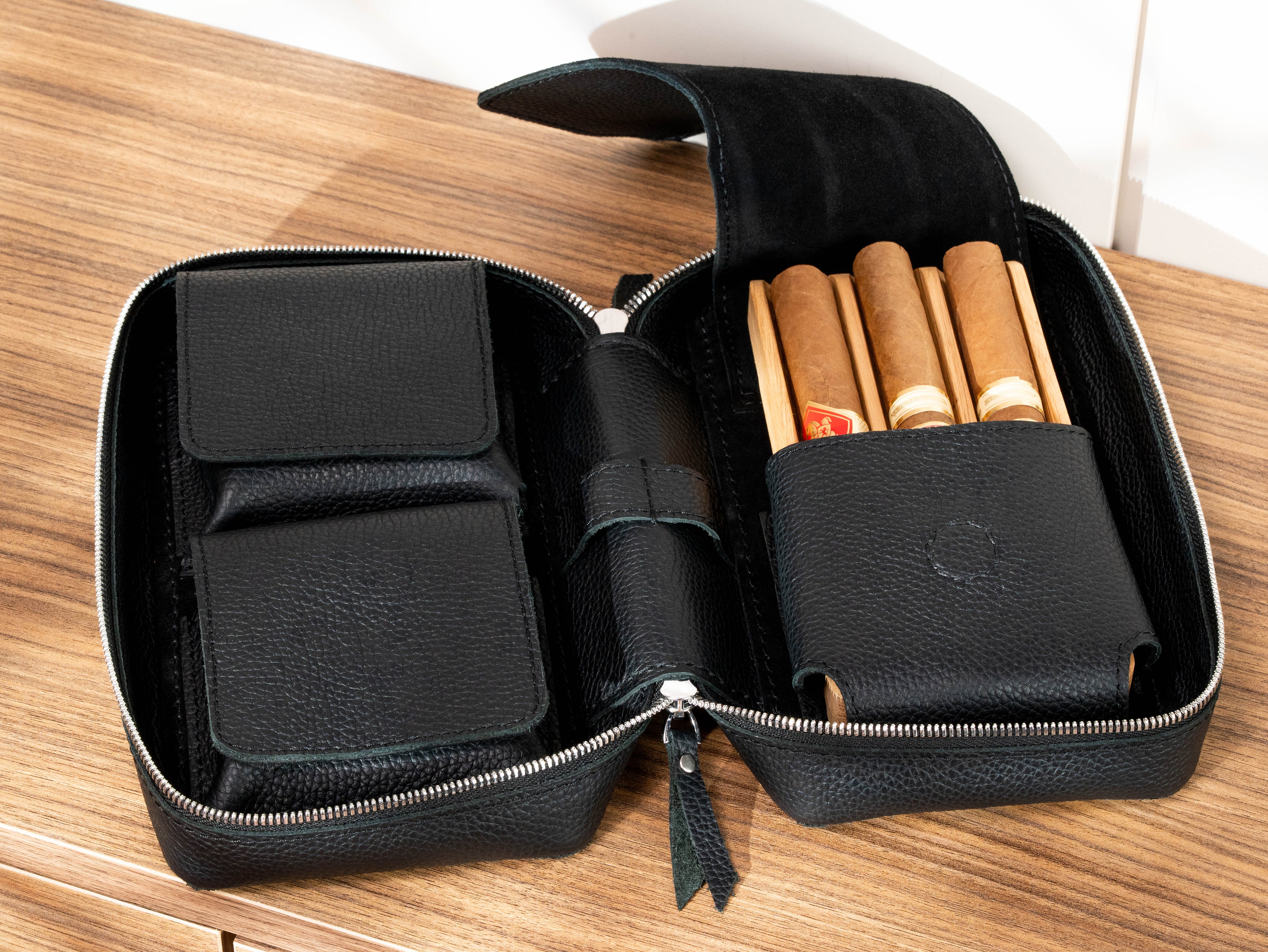 Open black leather cigar travel case with removable solid oak tray holding three cigars