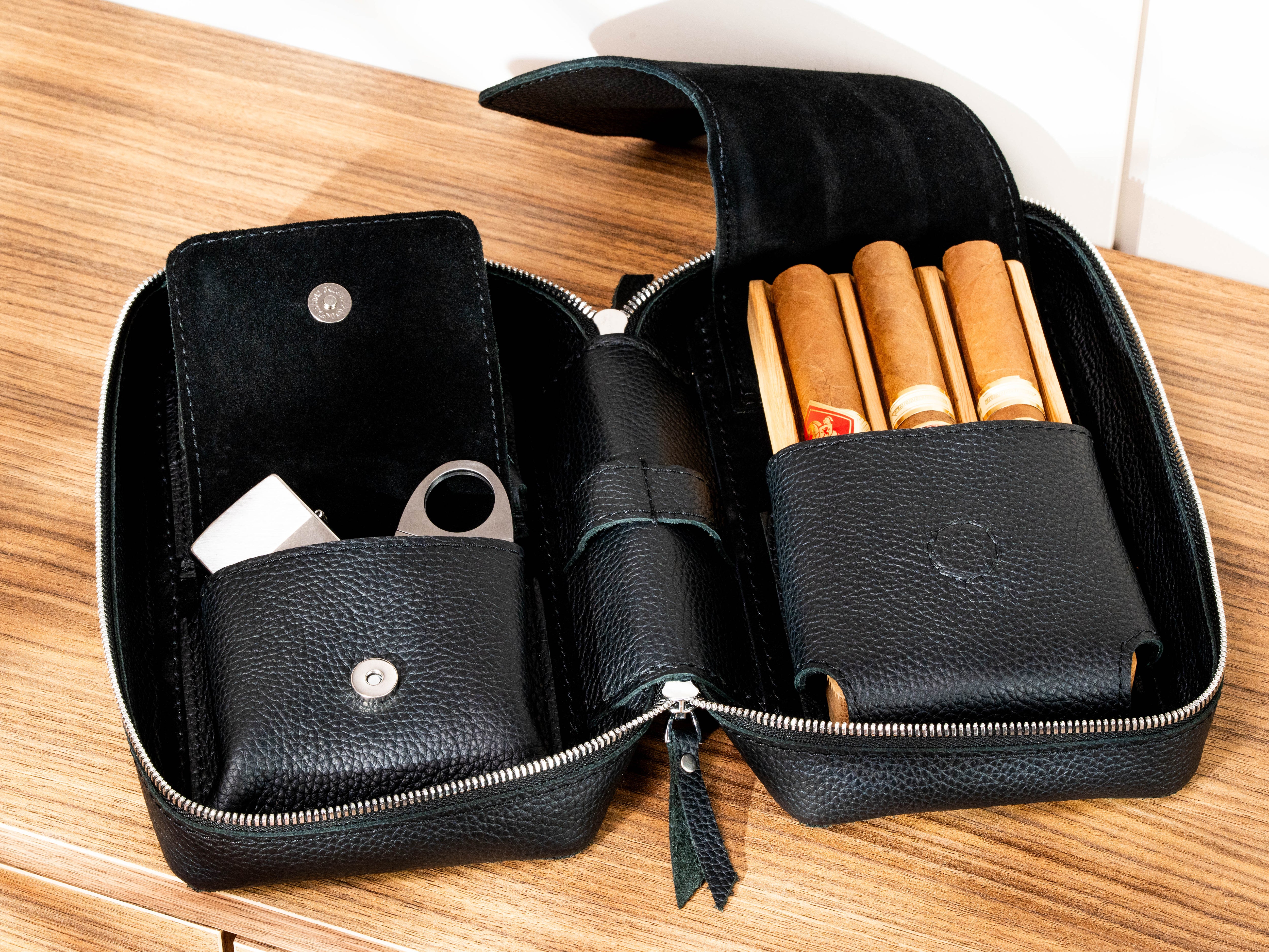 Black leather cigar organizer with three-cigar oak tray and separate pockets for lighter and cigar cutter