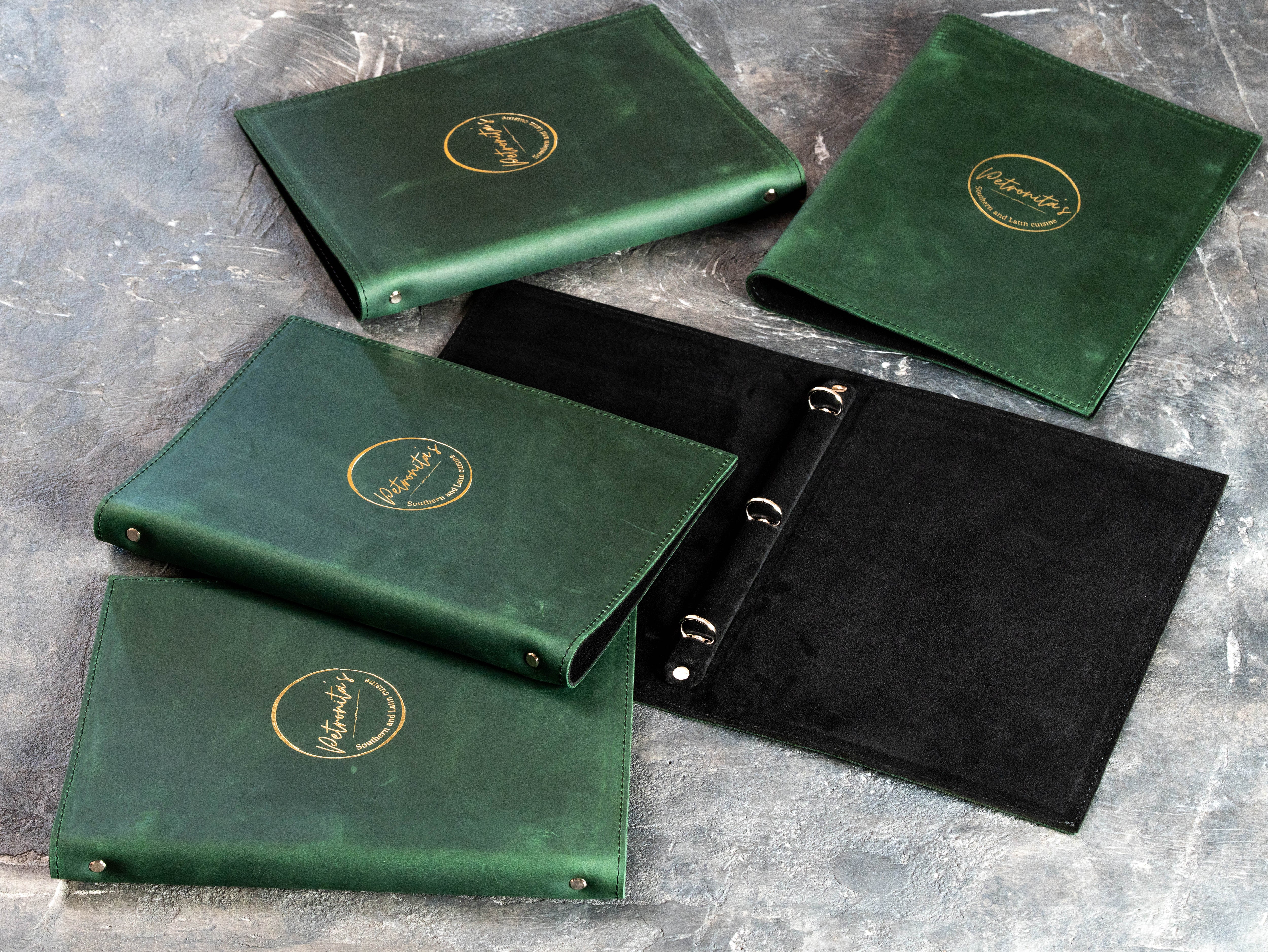 Custom Green Restaurant Menu Binder with Gold Foil Logo and Black Suede Interior | Mureli