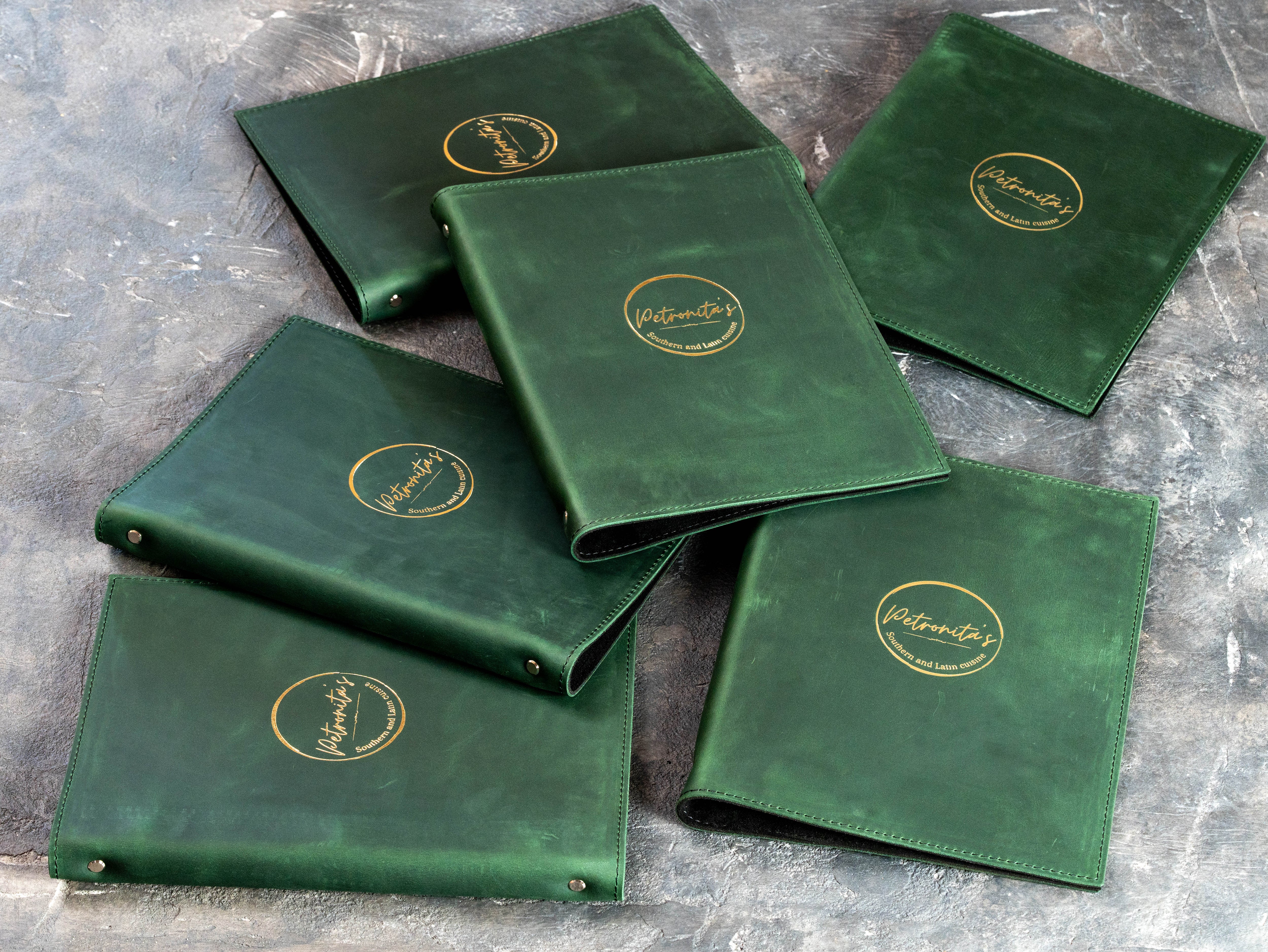 Refillable three-ring menu folder designed for restaurant menus, wine lists, and event documents