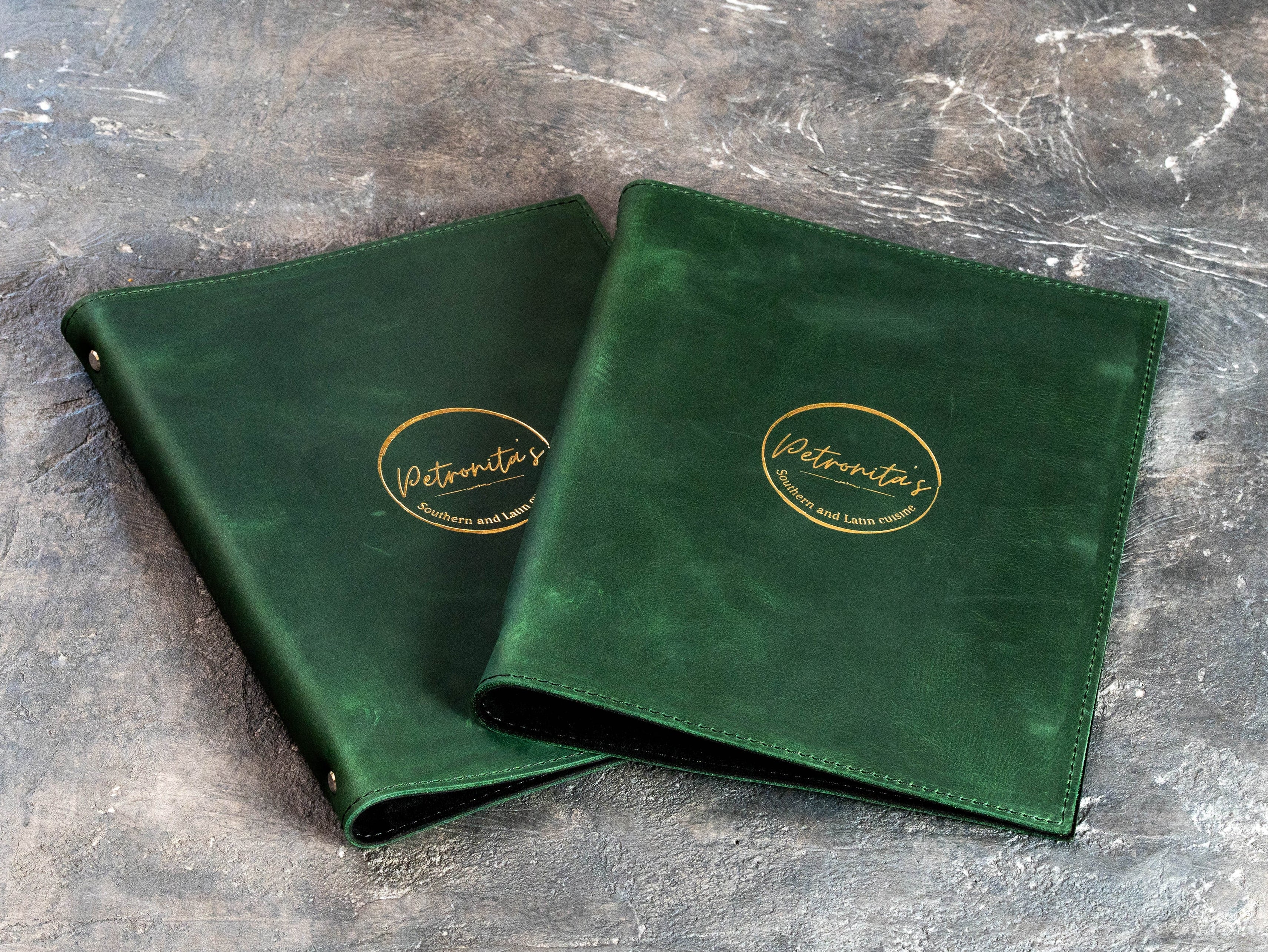 Custom Green Restaurant Menu Binder with Gold Foil Logo and Black Suede Interior | Mureli
