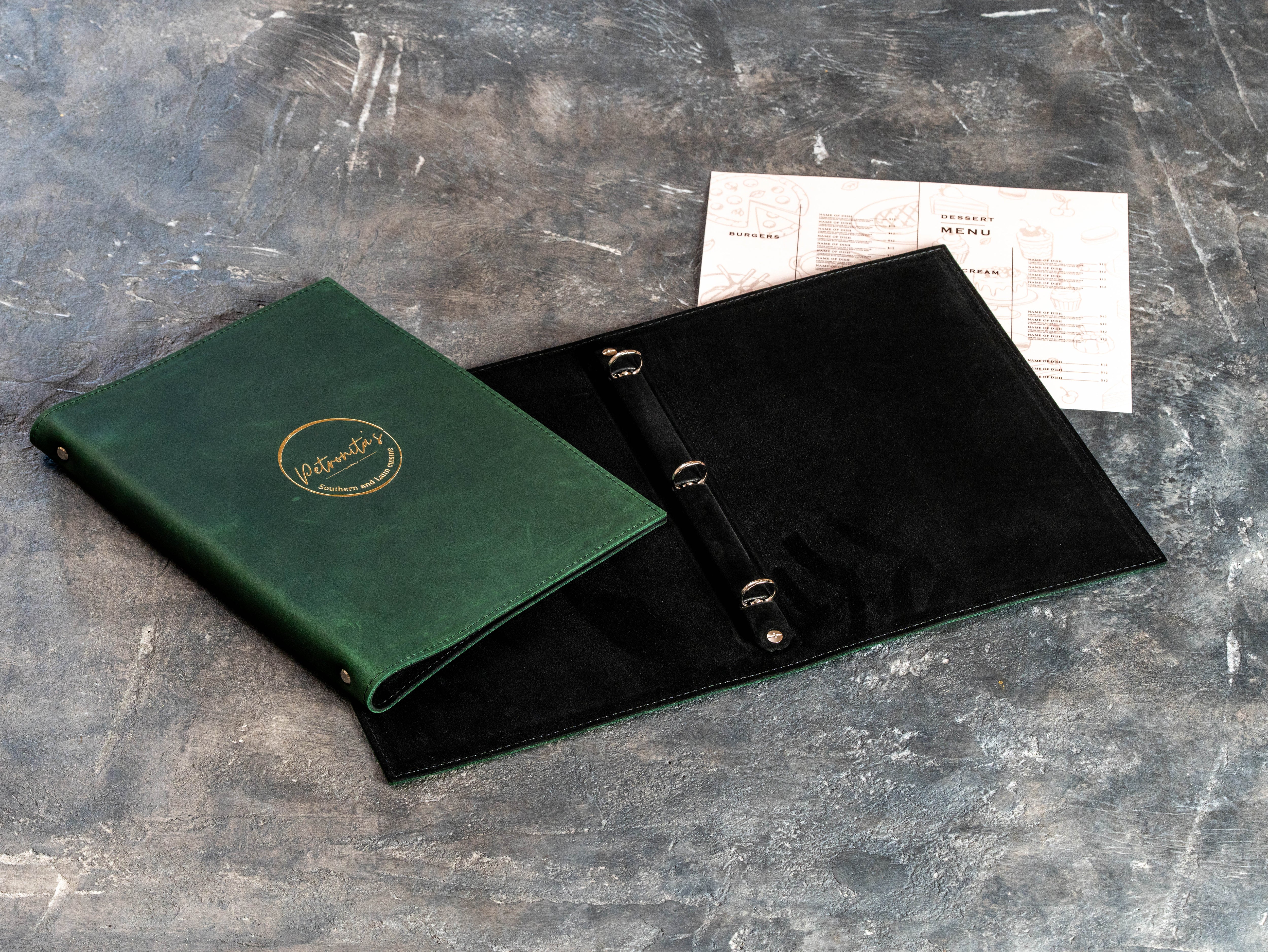 Custom Green Restaurant Menu Binder with Gold Foil Logo and Black Suede Interior | Mureli