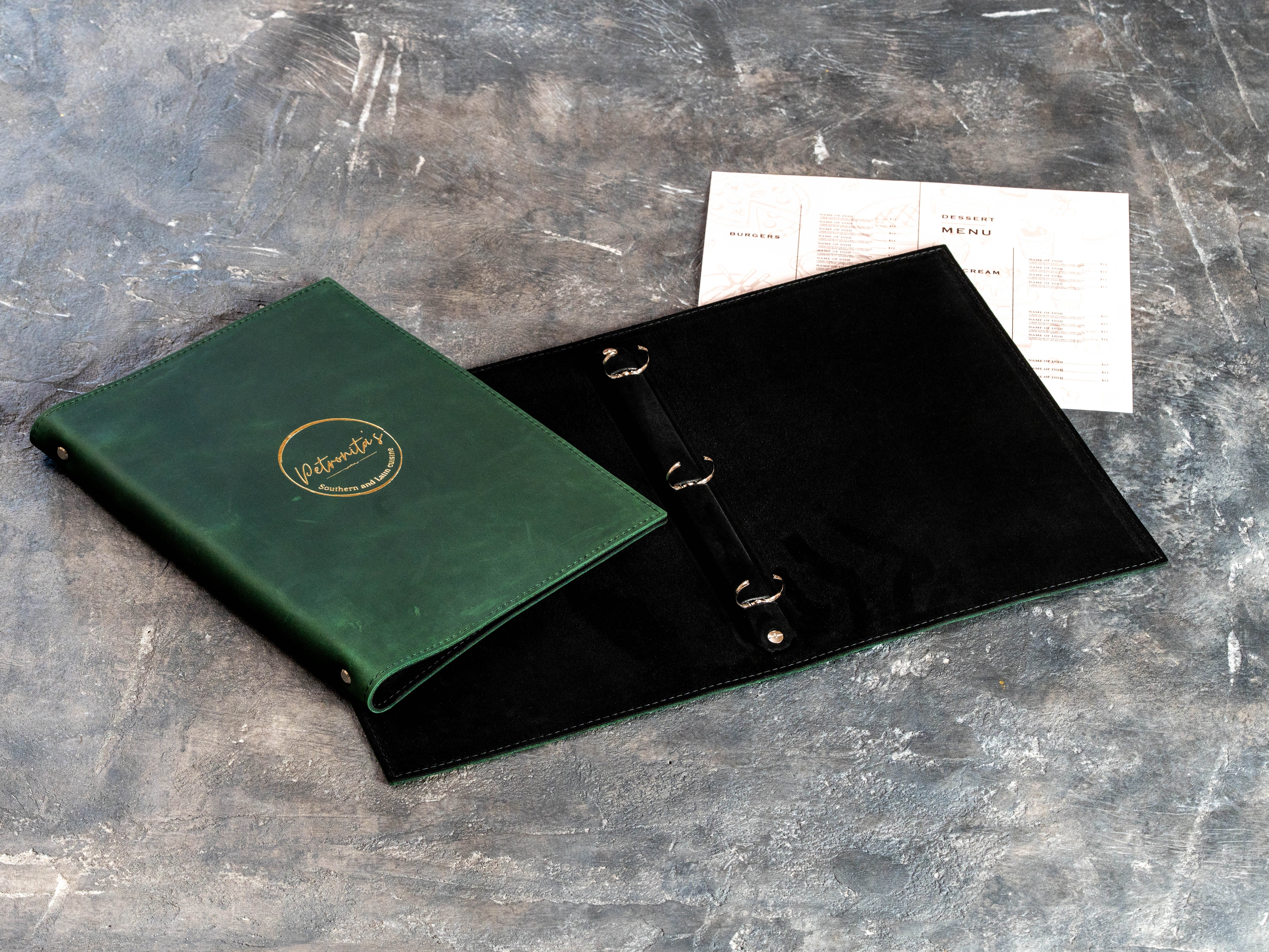 Open A4 restaurant binder with black suede panels and removable three-ring hardware