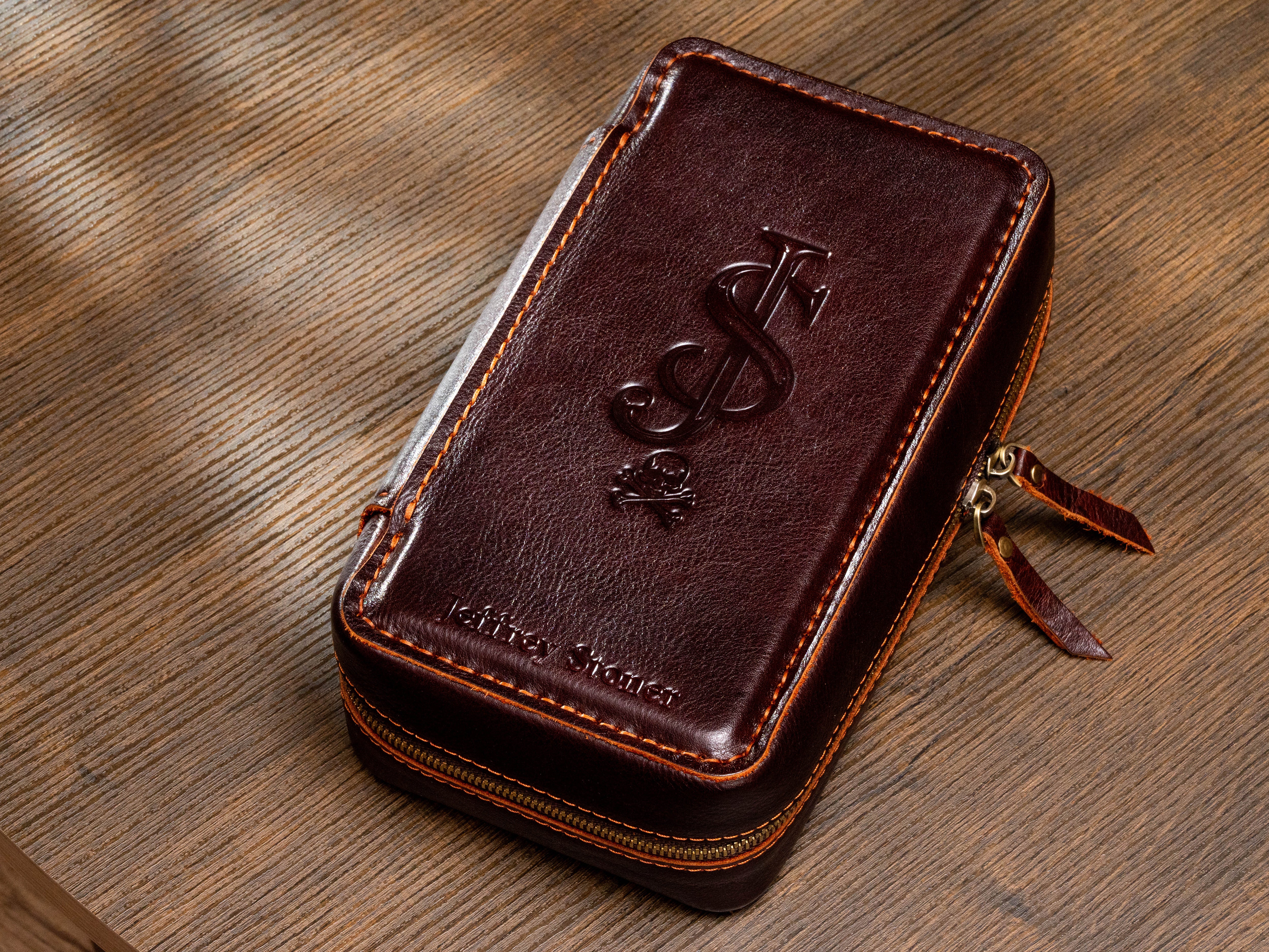 Personalized dark brown leather cigar travel case with custom blind embossed monogram, name and zip-around closure