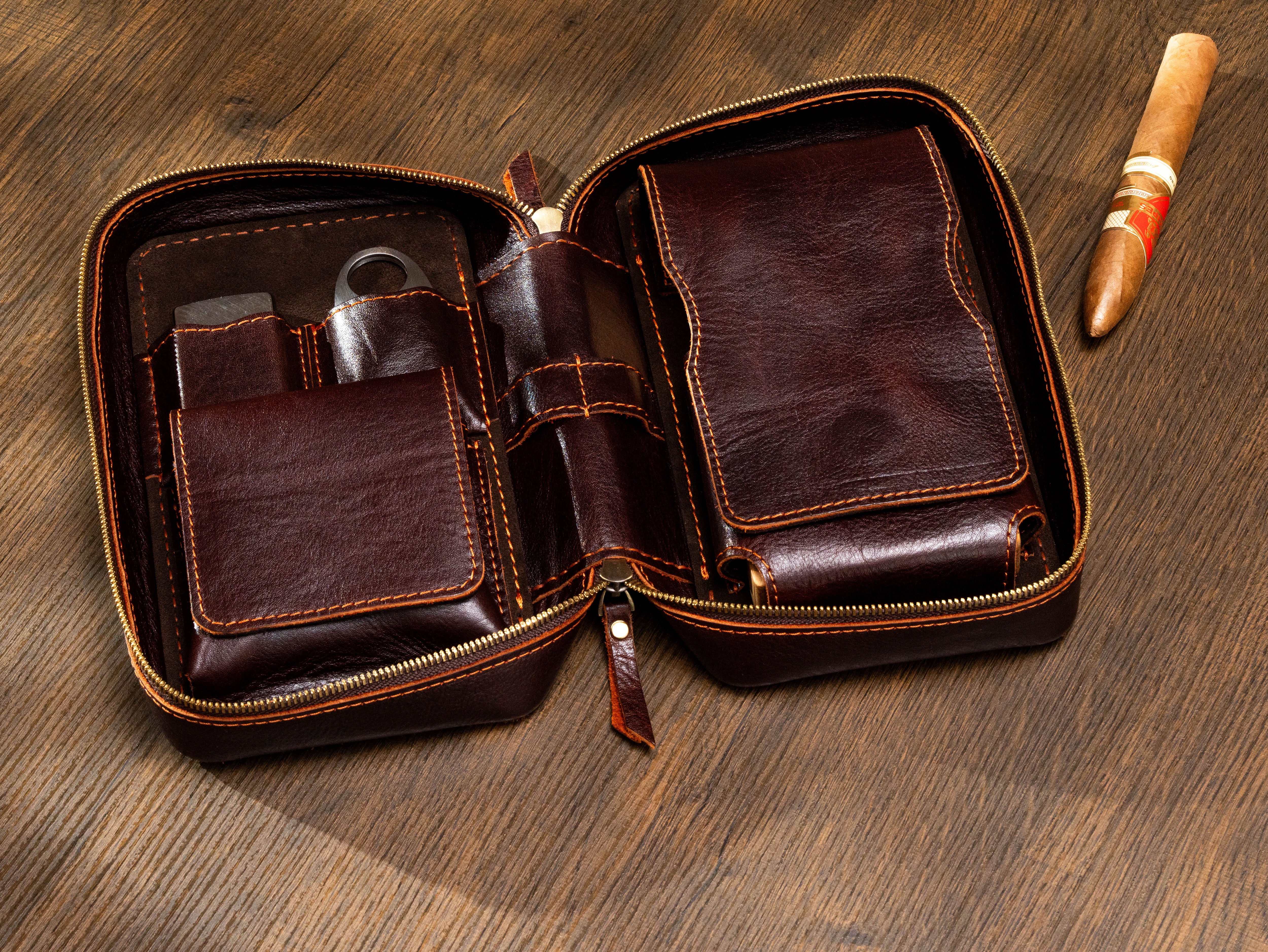 Open personalized leather cigar accessory organizer with dedicated cutter, lighter and oak cigar tray compartments