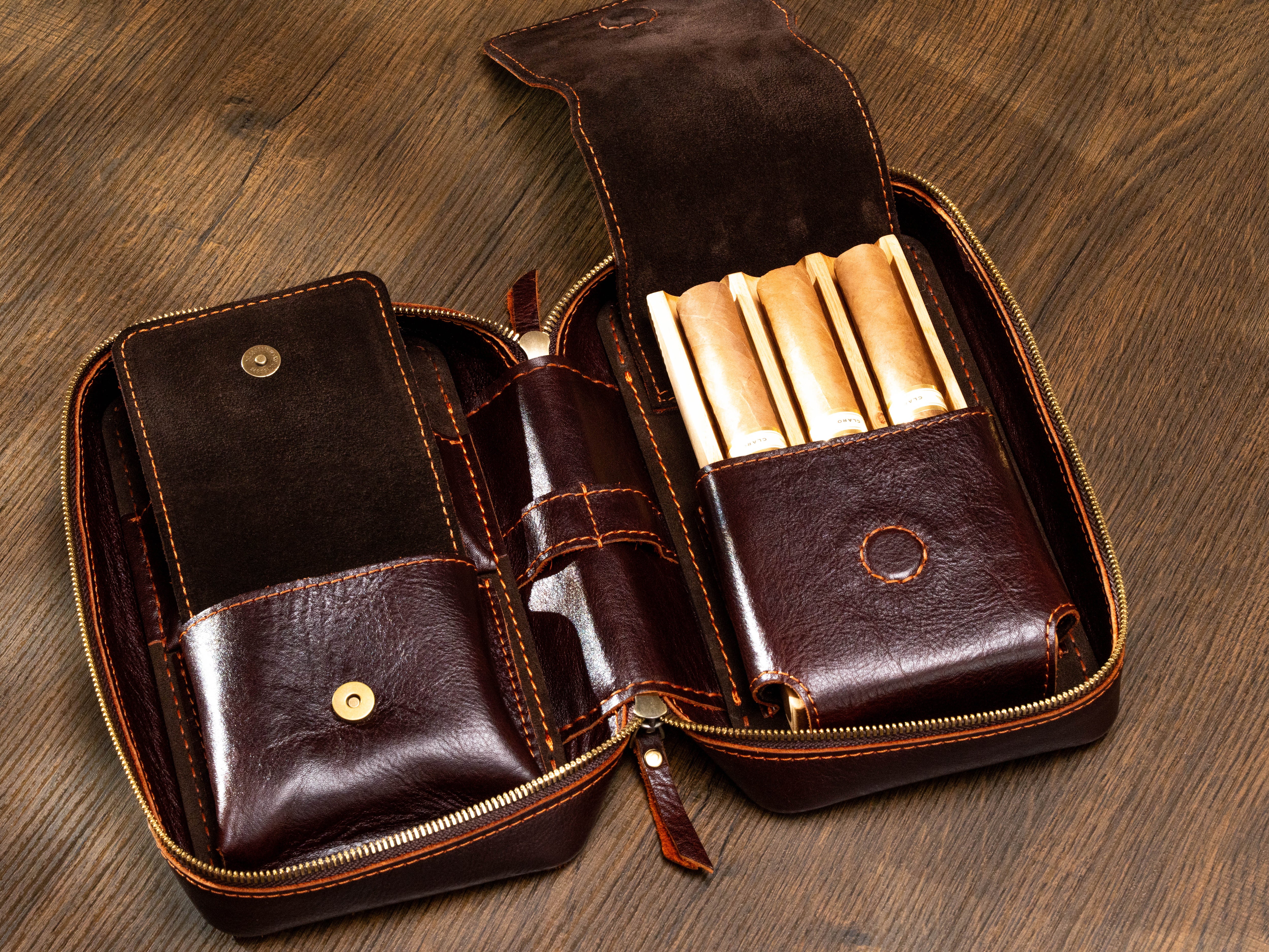 Open cigar organizer with oak three-cigar tray, snap pocket and separate accessory compartments