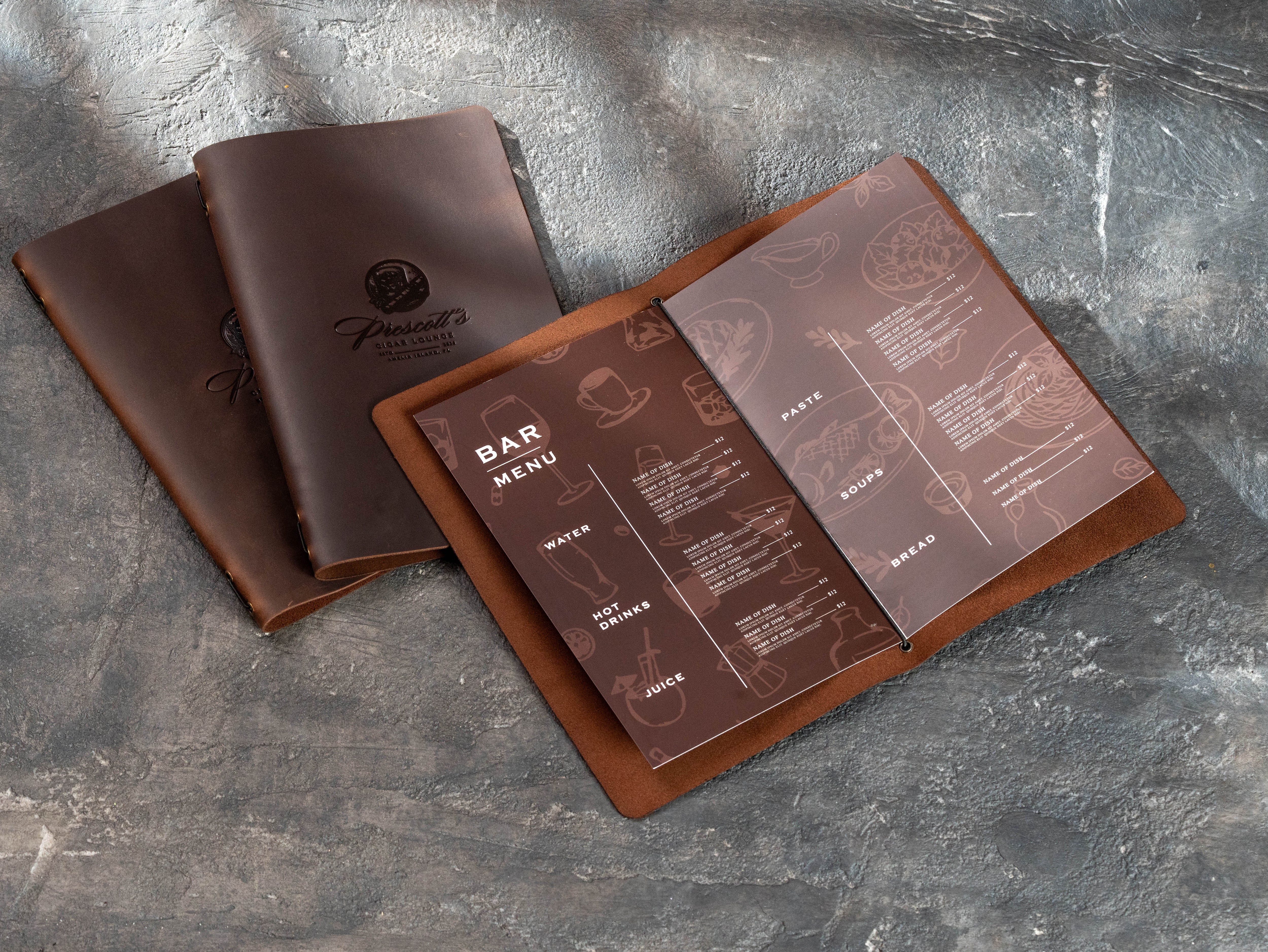 closed brown leather cigar lounge menu covers personalized with dark embossed business logos