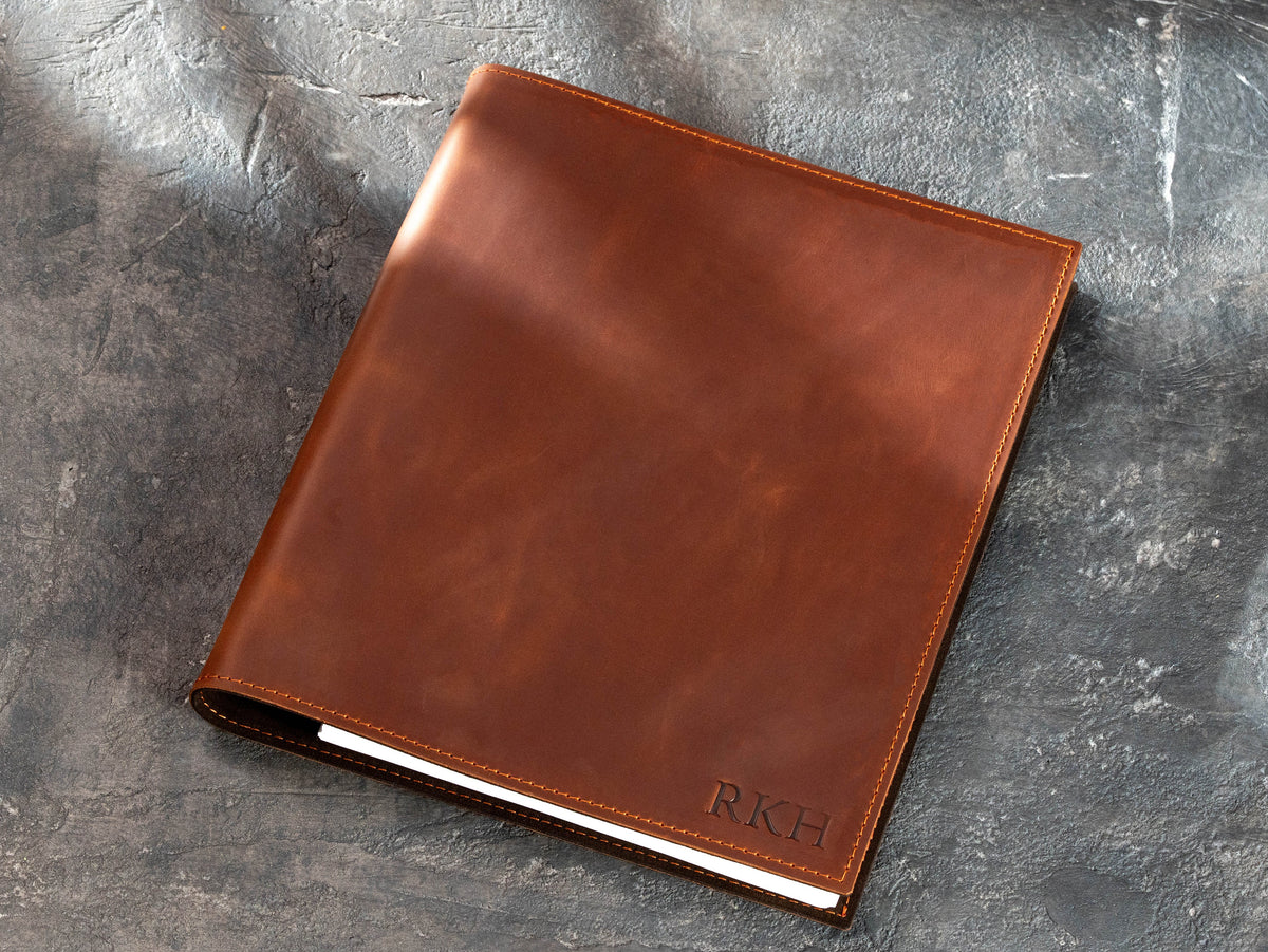 Closed personalized Copper leather document binder with RKH initials embossed in the bottom right corner