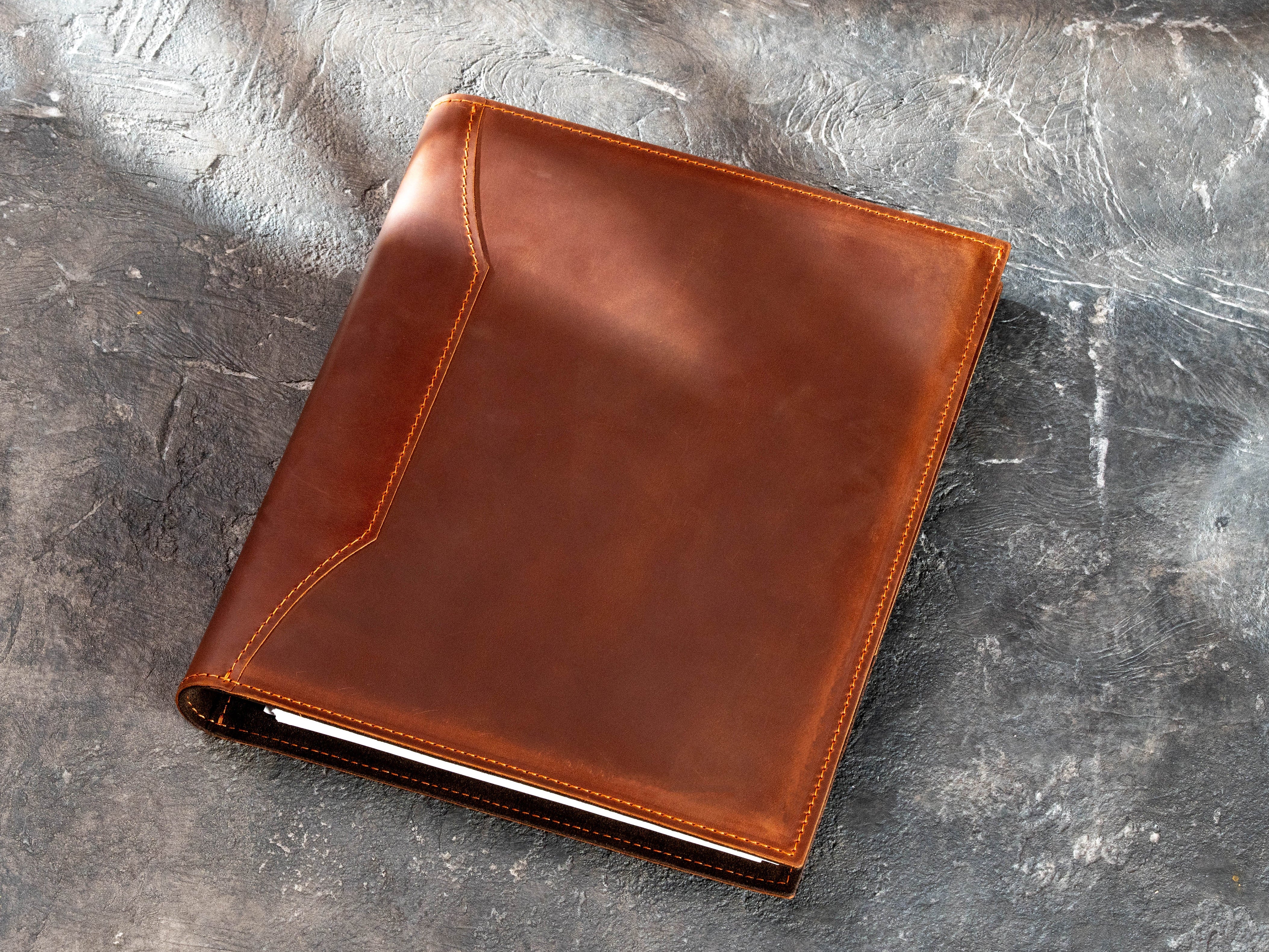 Closed Copper leather 3-ring business binder without personalization, showing natural leather texture