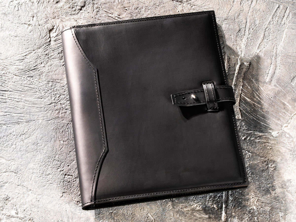 Black personalized Crazy Horse leather portfolio and padfolio with strap closure