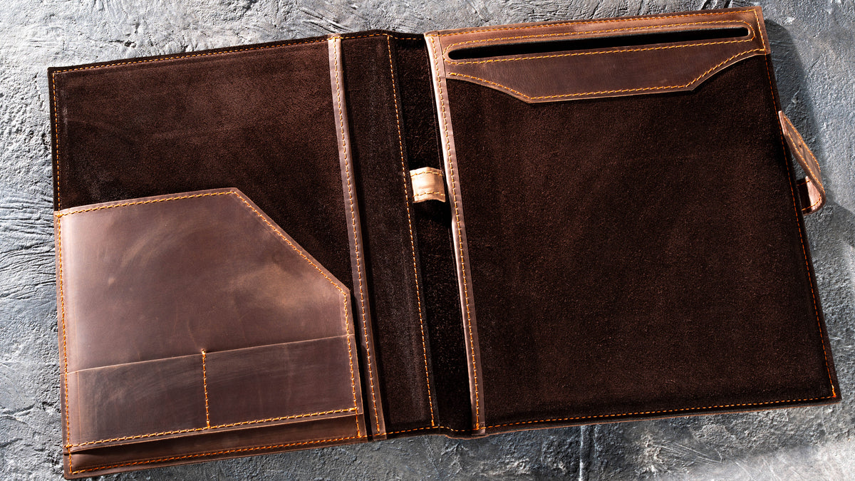 Open Brown leather padfolio with suede interior, card pockets and legal pad holder