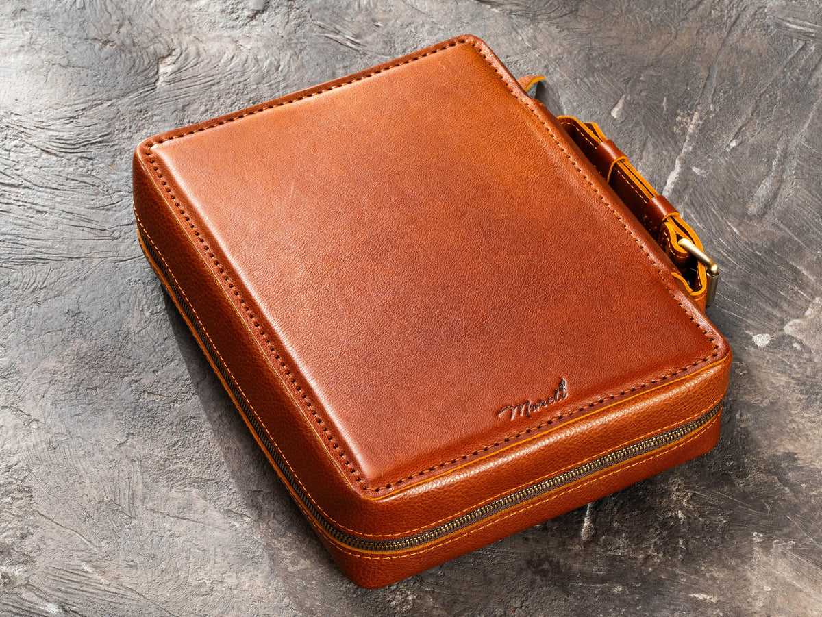 Closed Camel leather travel organizer case with zip-around closure and classic handcrafted design