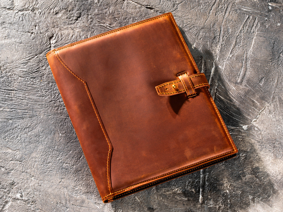 Copper personalized Crazy Horse leather portfolio and padfolio with strap closure