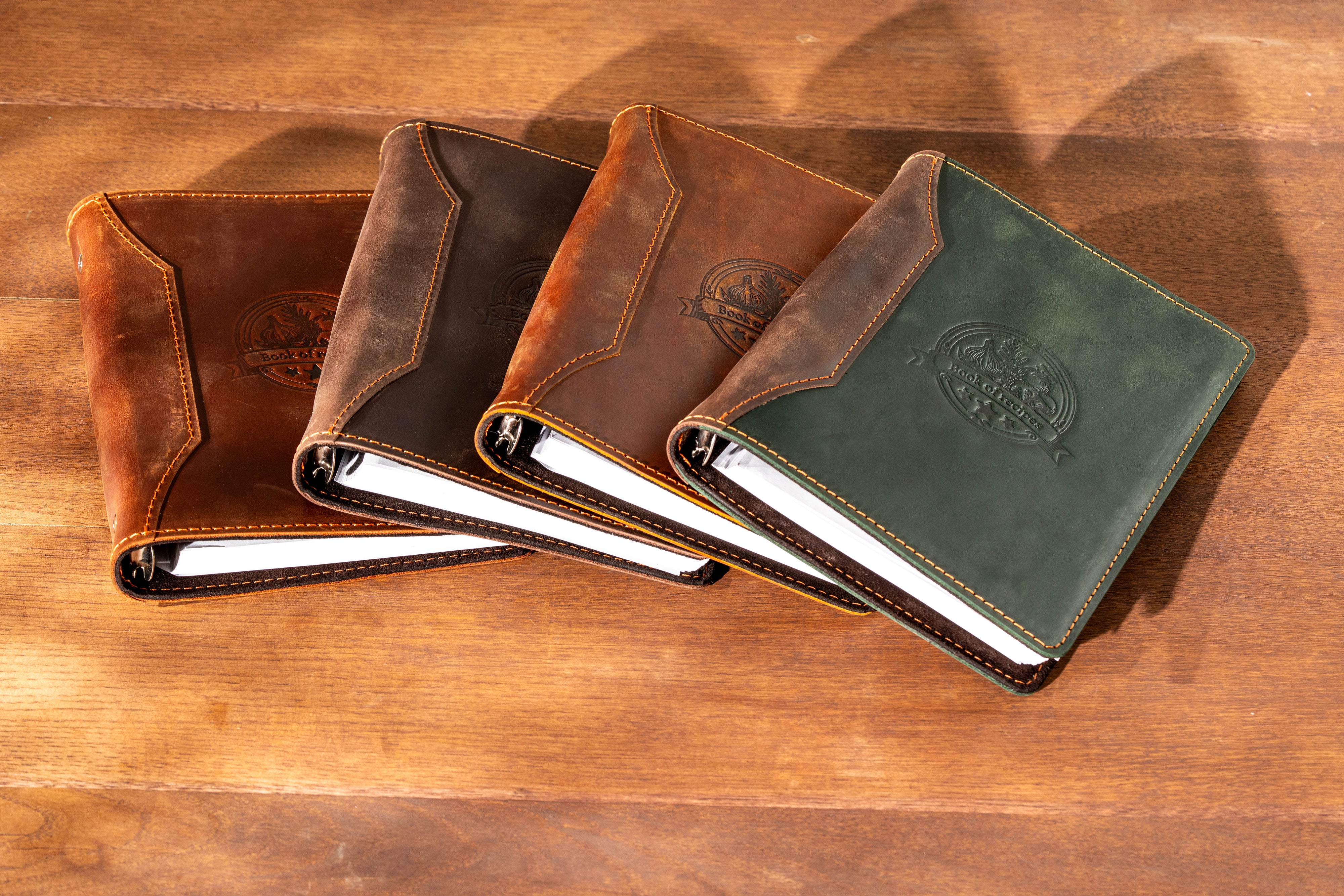 Set of 4 leather recipe binders with embossed recipe book designs