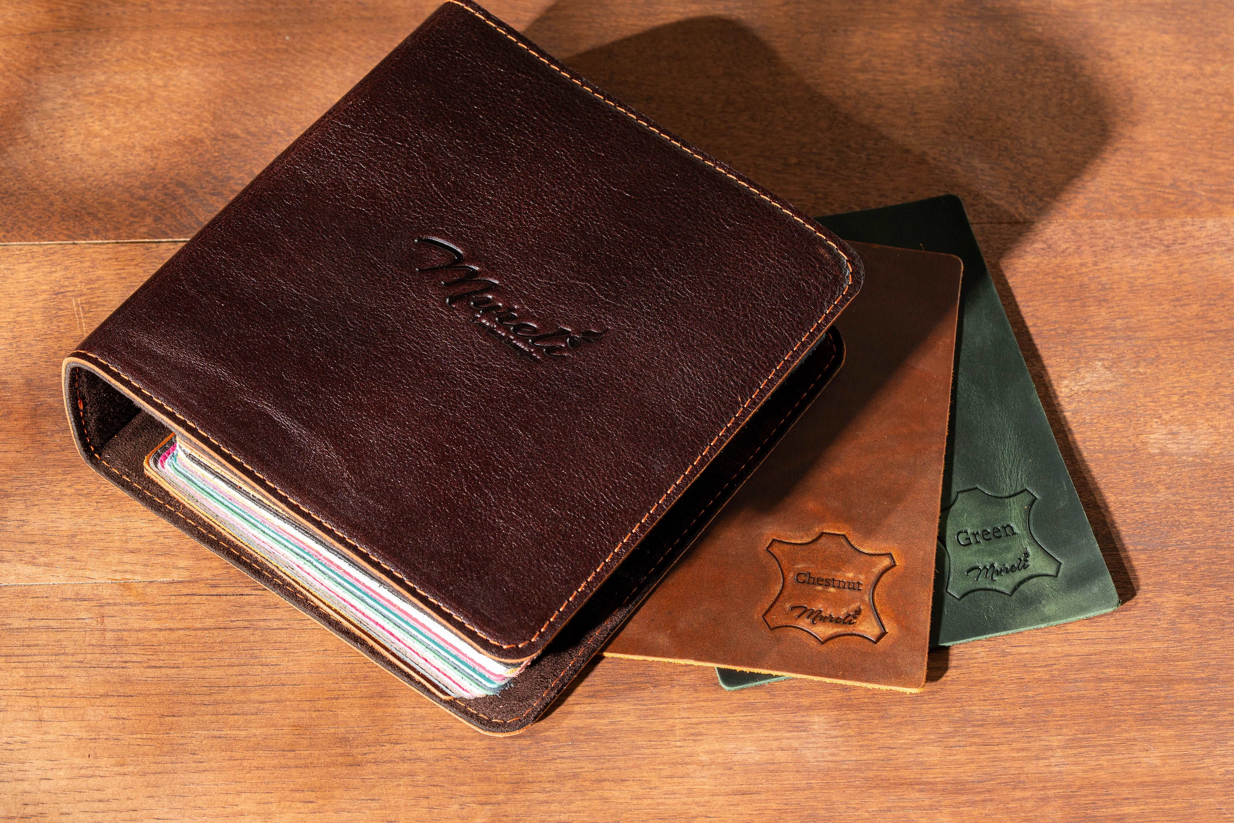 Mureli leather sample binder with chestnut and green swatches showing stamped color names and logo