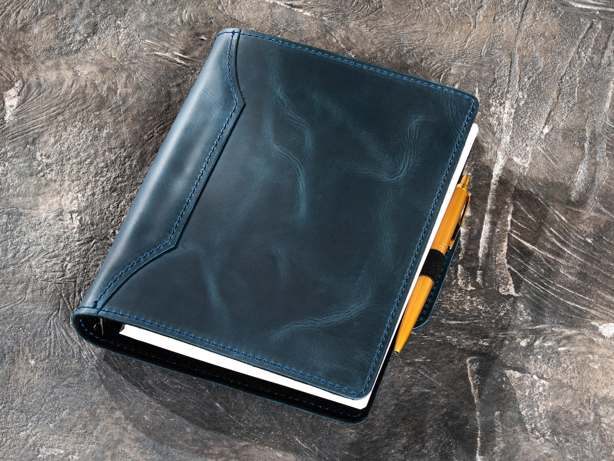 Deep Blue refillable A5 leather notebook with pen secured in elastic pen loop