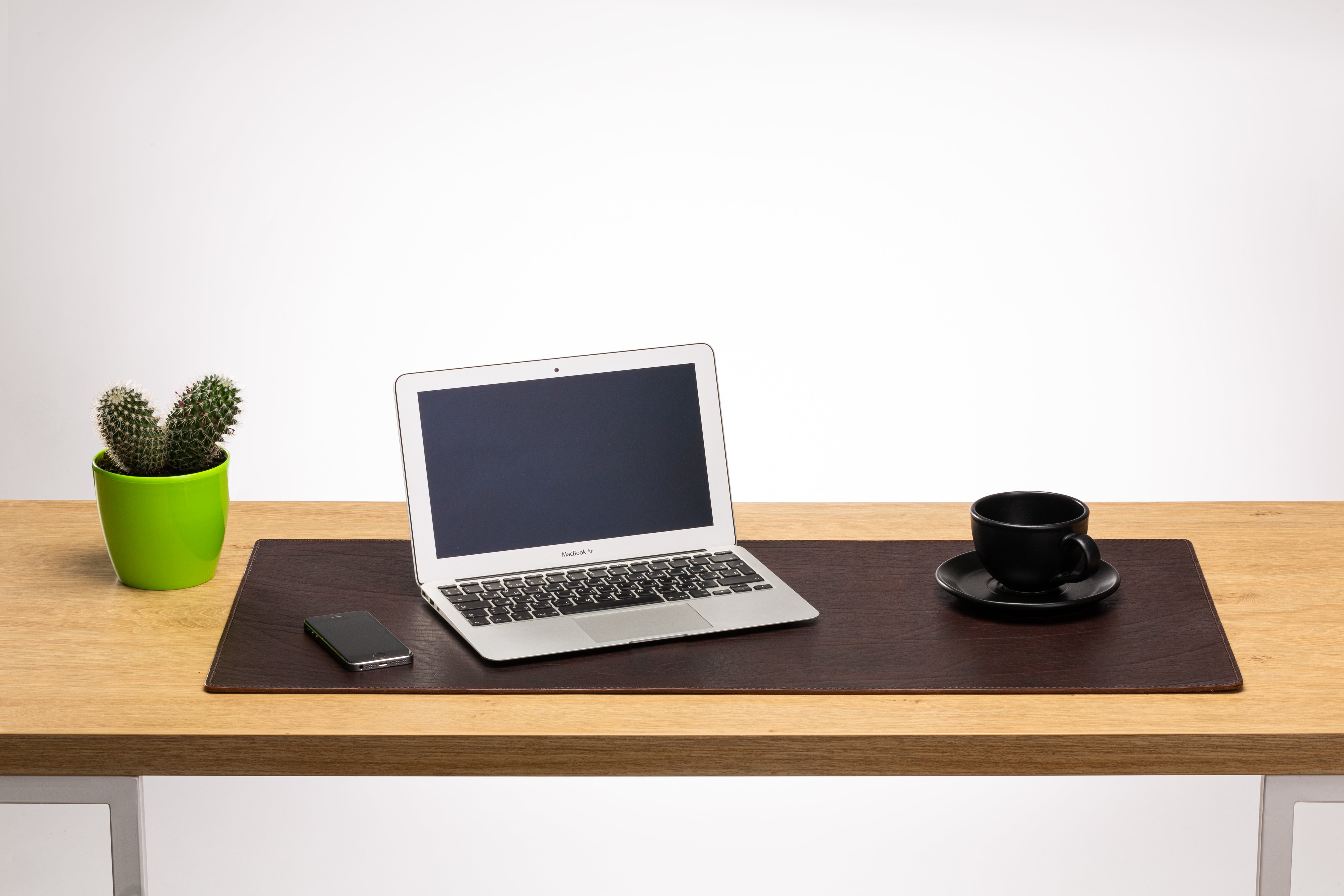 Hand-finished edge detail, premium leather desk mat