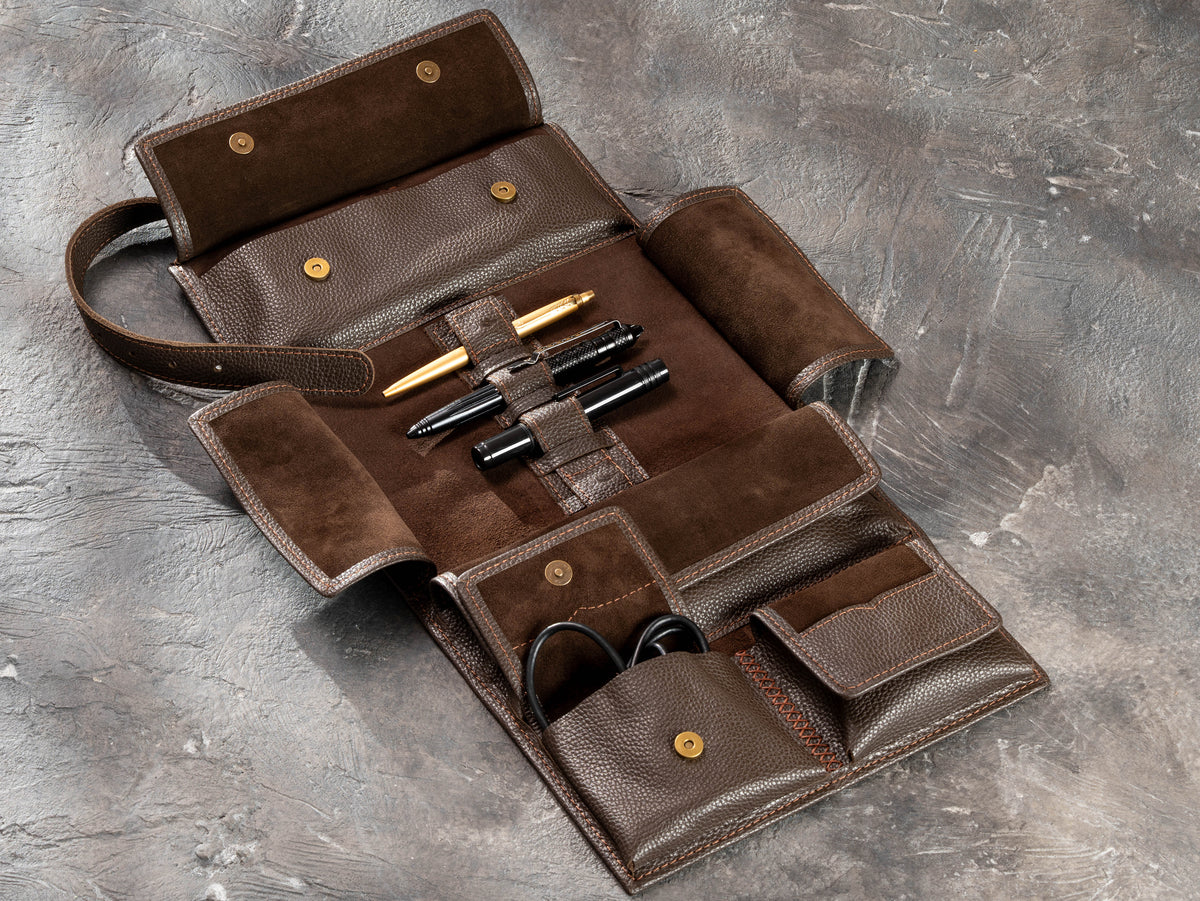 Fully opened Chocolate Brown leather travel organizer showing magnetic pockets, suede lining and elastic holders