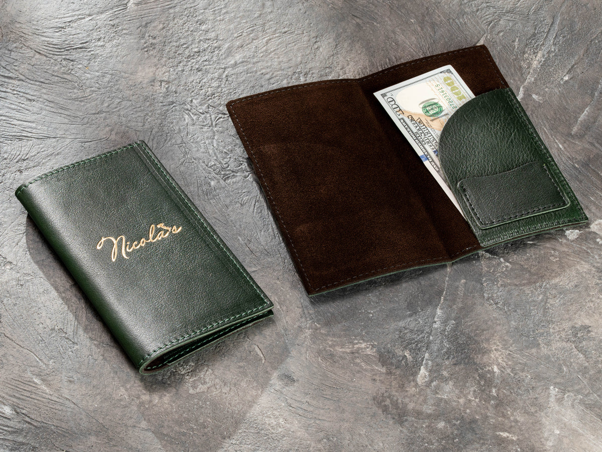 Dark green leather restaurant check presenter with brown suede interior, cash pocket and card pocket
