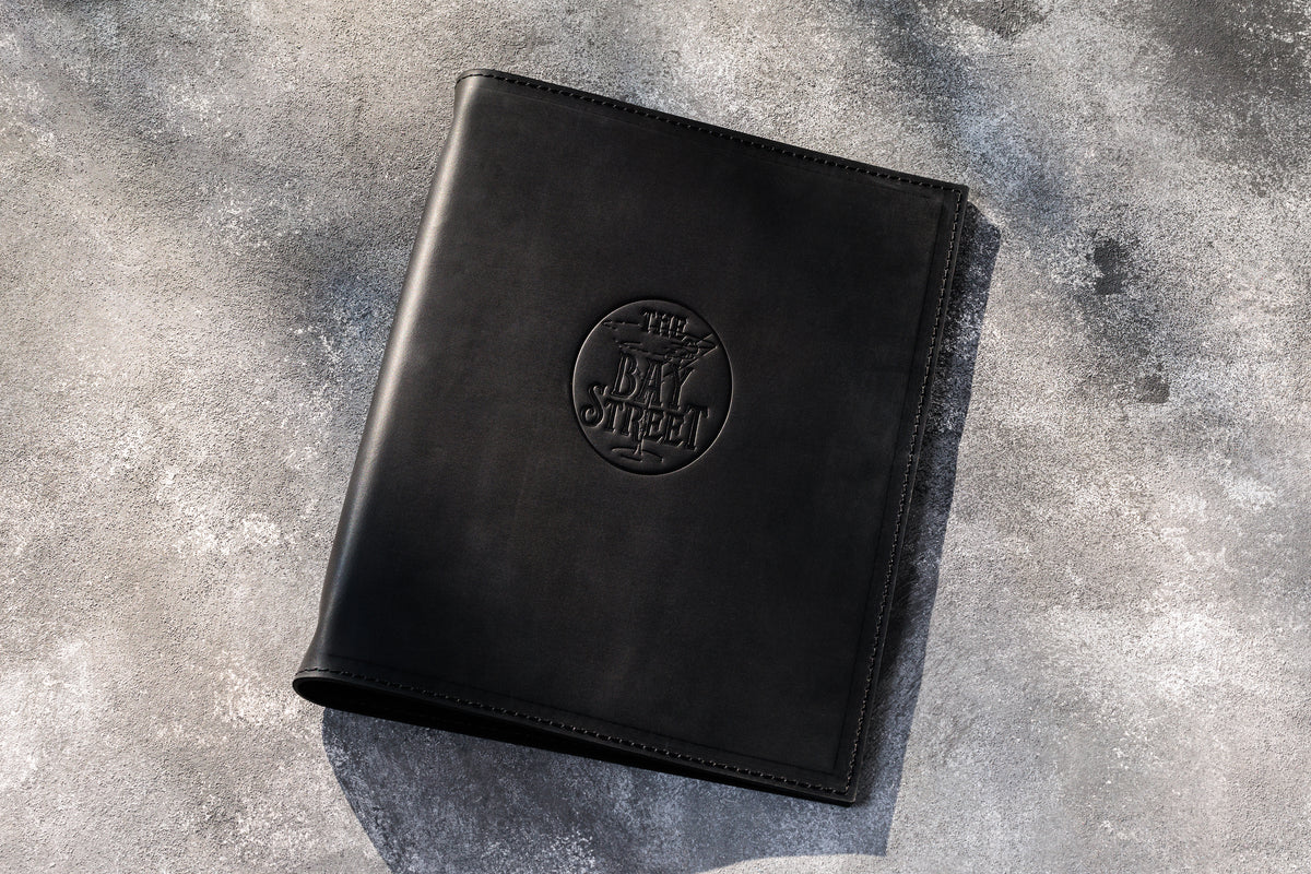 Black leather 3-ring restaurant menu binder with custom embossed logo