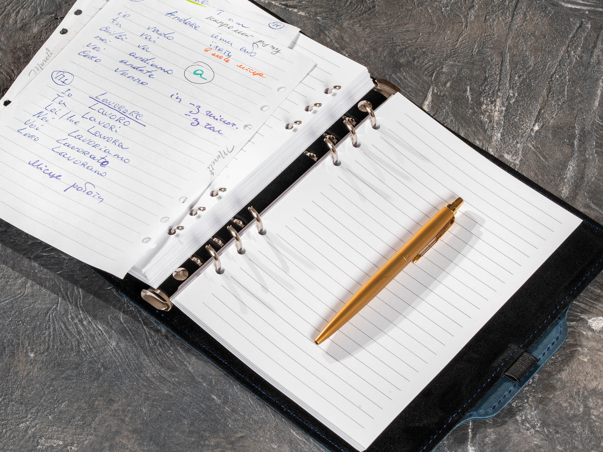 Deep Blue refillable business notebook with lined pages and gold pen