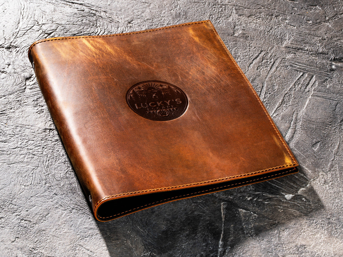Custom logo Chestnut leather 3-ring binder made from Crazy Horse leather for business presentations