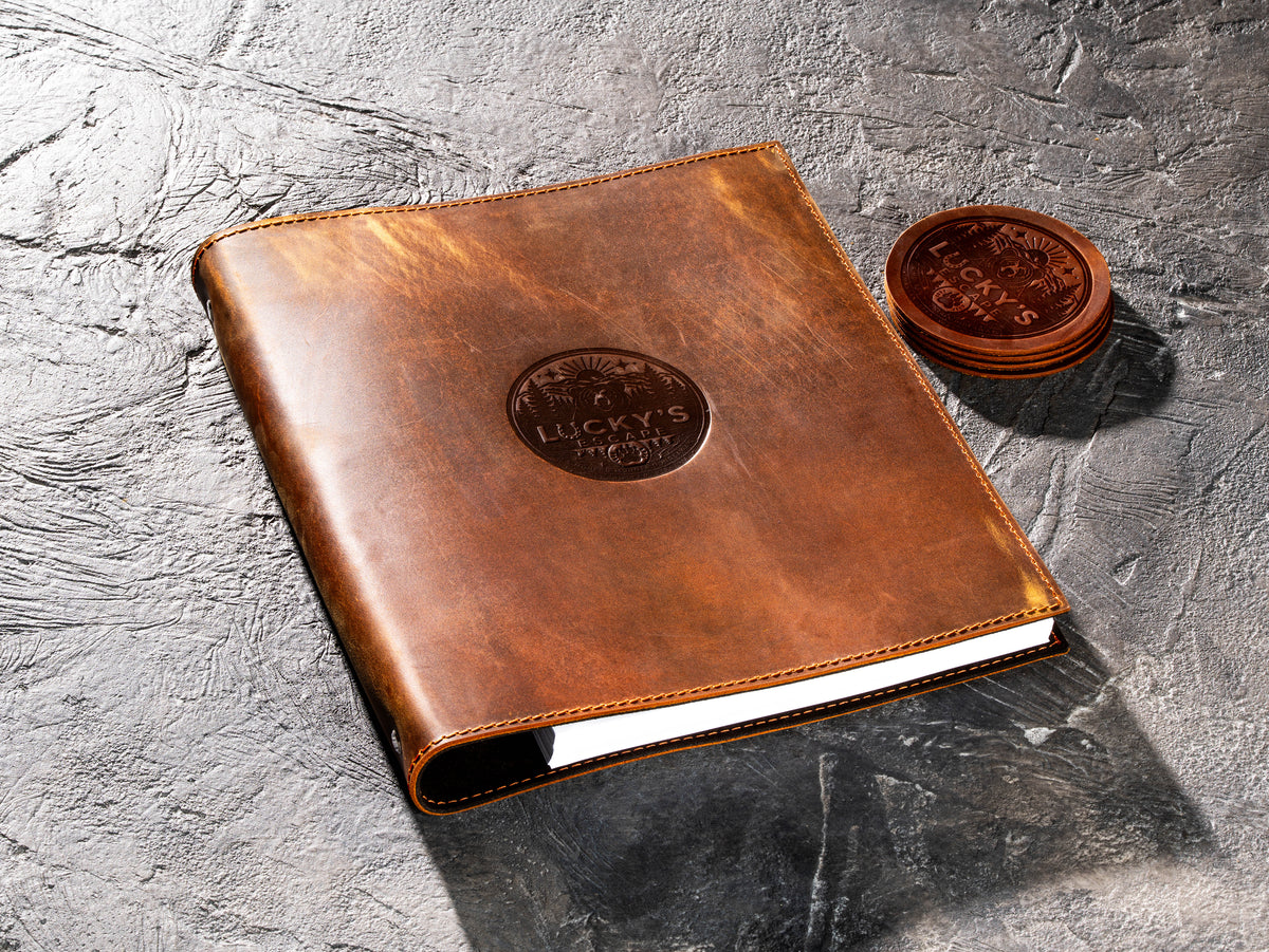 Chestnut leather corporate binder with set of four matching personalized leather coasters
