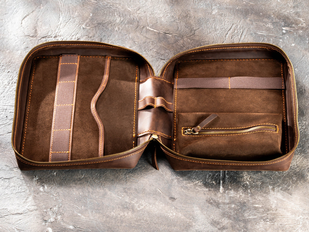 Open Milk Chocolate Brown leather travel organizer showing flat pocket, elastic holders, suede interior and inner zip pouch