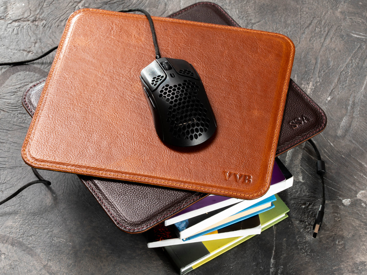 Camel leather mouse pad with black wired computer mouse and embossed initials
