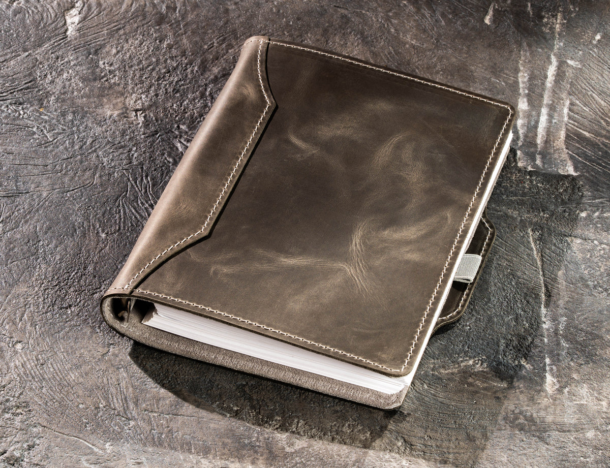 Gray personalized leather business notebook for A5 and 8.5 x 5.5 pages on dark background