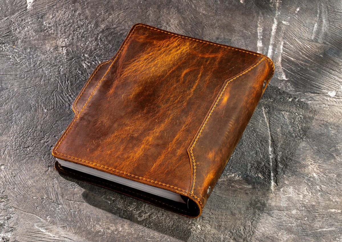 Back view of Chestnut Crazy Horse leather refillable notebook showing natural pull-up leather texture