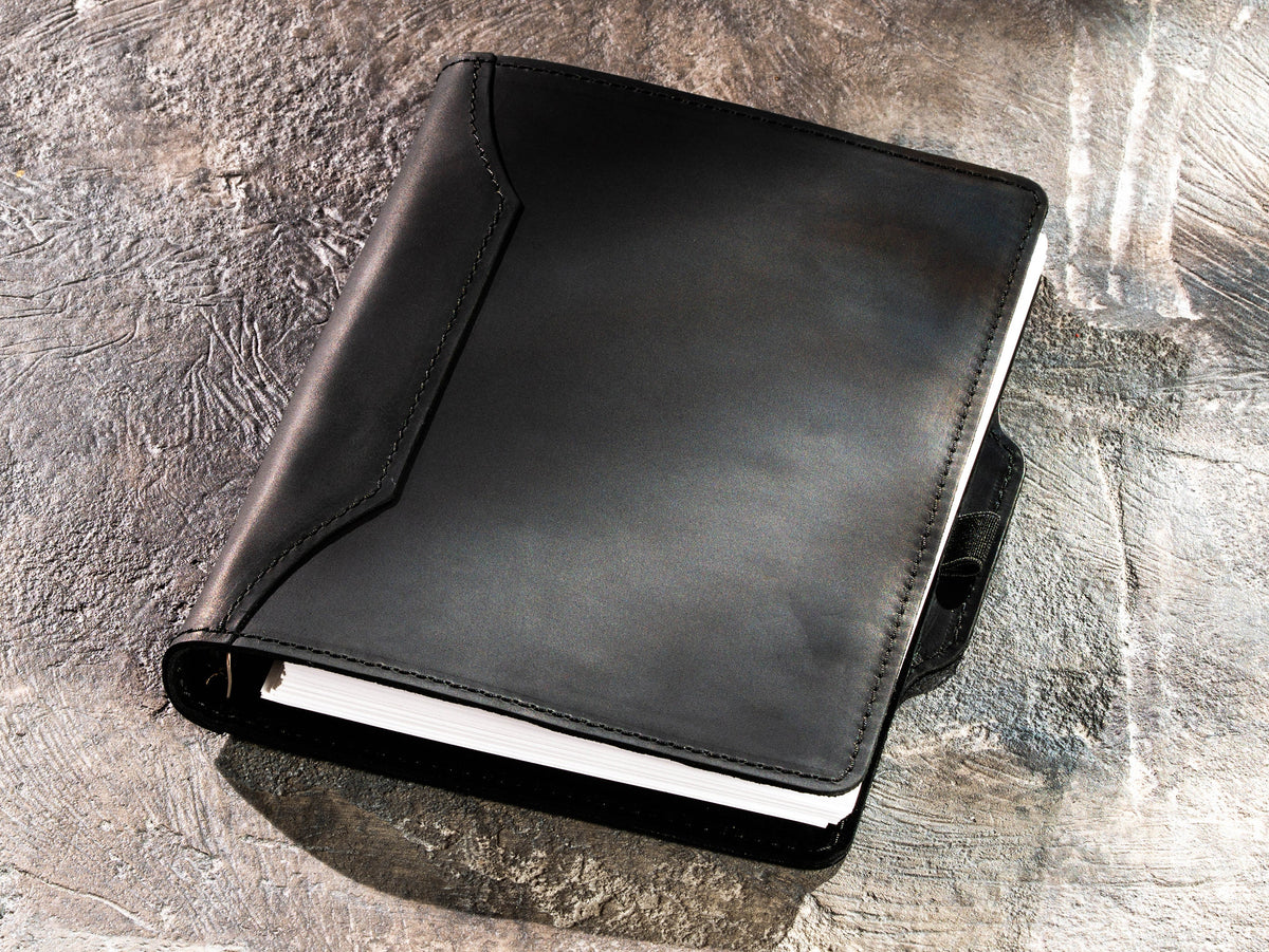 Black Crazy Horse leather refillable notebook for A5 and 8.5 x 5.5 paper, closed front view