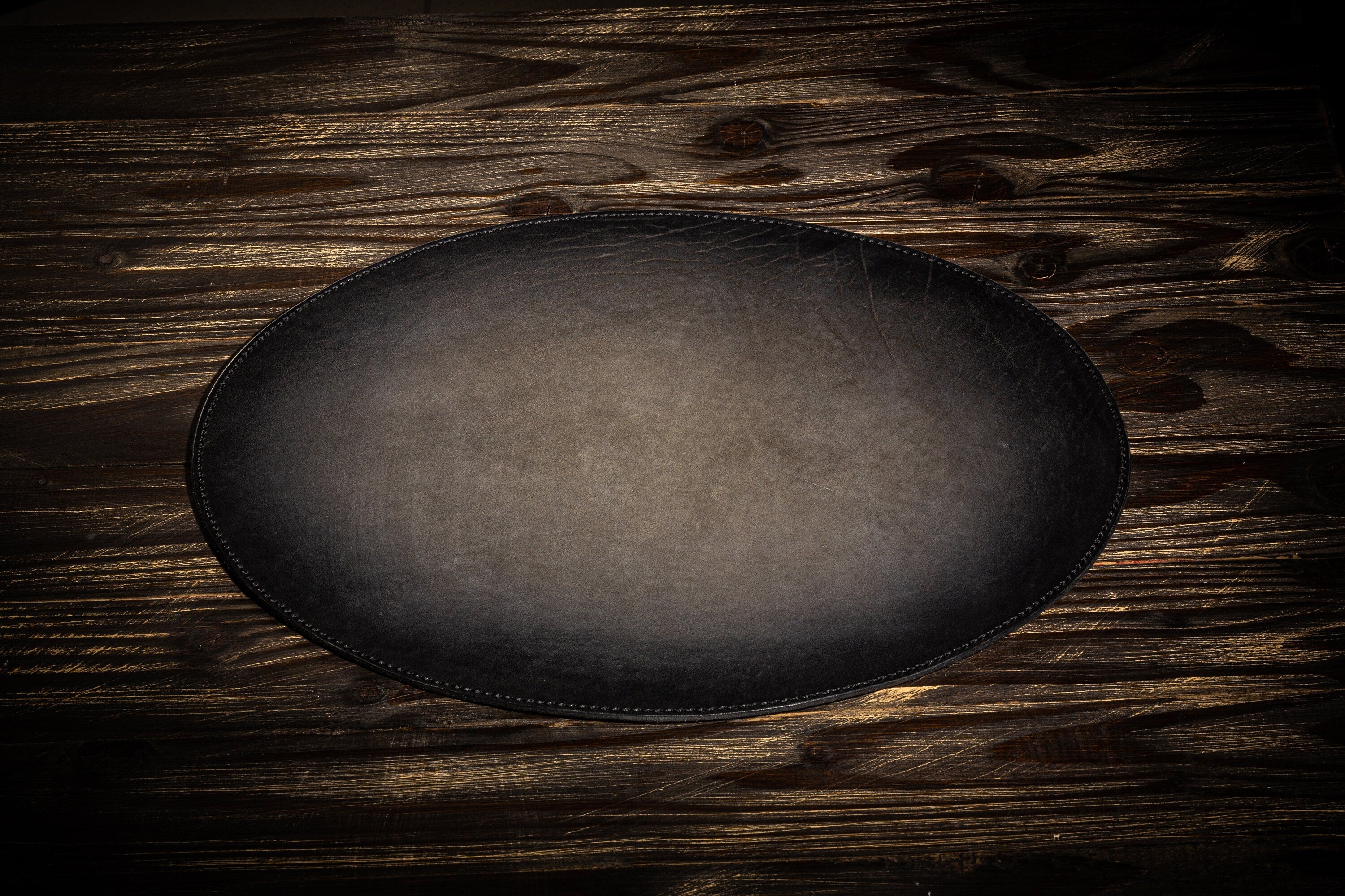 Elegant Grey Leather Table Mats – Oval Shape for Stylish Dining Rooms