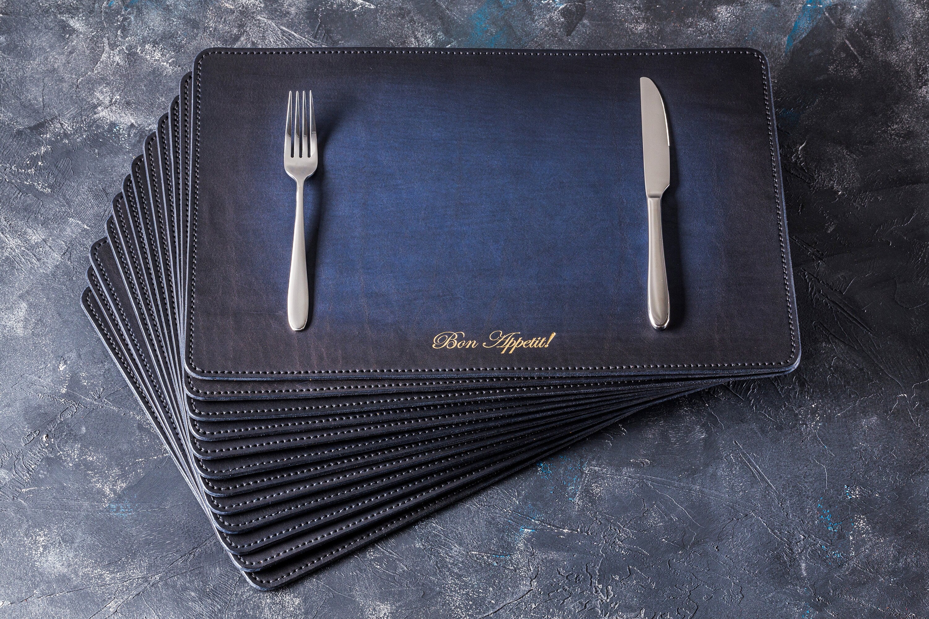 Navy Blue Leather Placemats Set with “Bon Appétit” Embossing